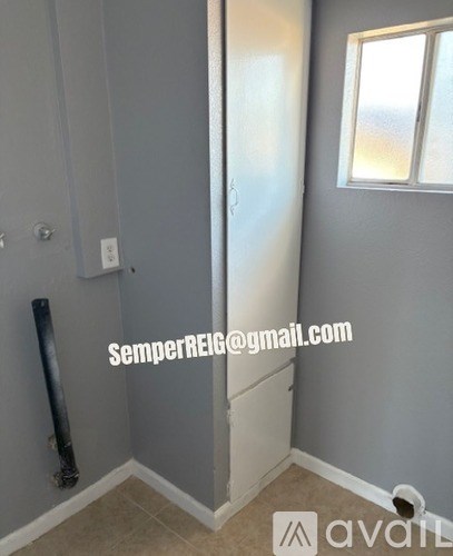 A room with a door and a window.