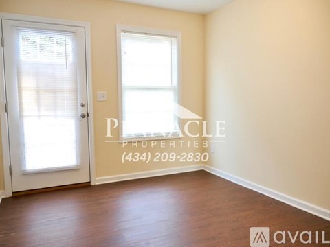 A room with a door and a window is available for rent.