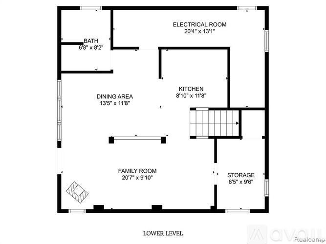 A floor plan of a house with a family room, kitchen, dining area, bathroom, and storage space.
