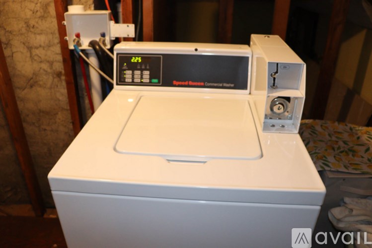 A white commercial oven with a digital display on top.