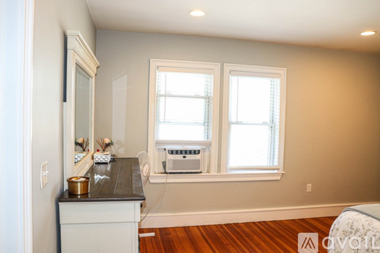 A small kitchen with a wooden counter and a window.