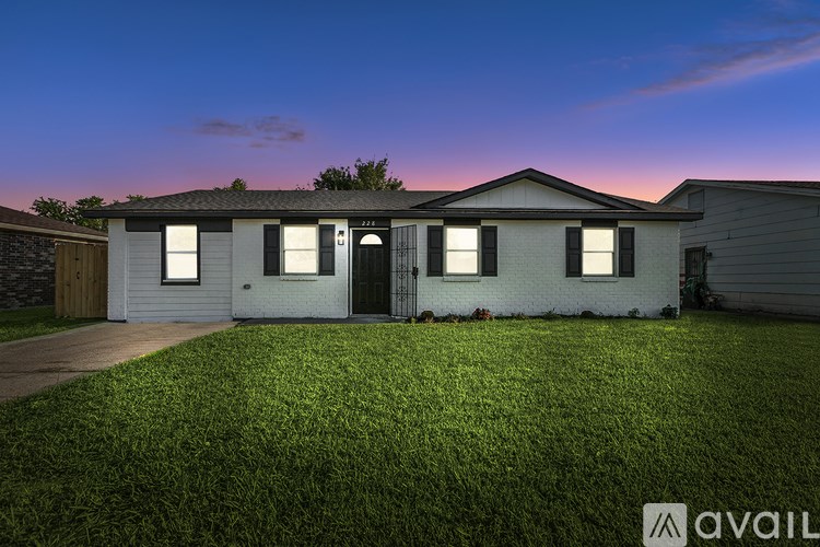 A house with a lawn in front of it is available for sale.