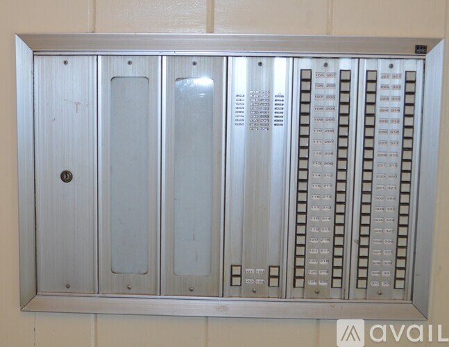 A metal panel with a grid of numbers and letters.