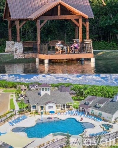 A pavilion with a metal roof is situated on a body of water, and there is a house with a pool in the foreground.