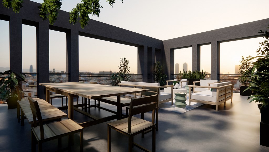 A modern outdoor dining area with a table set for six.