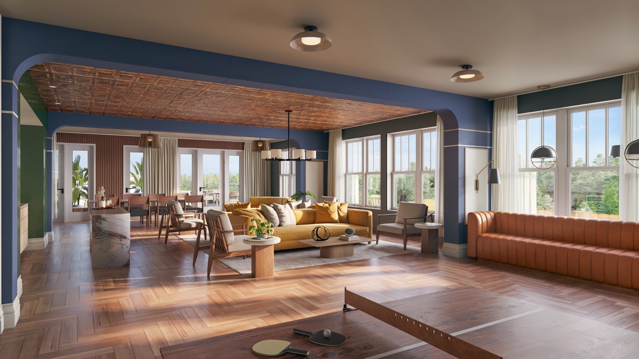 A living room with a wooden floor and a large window.