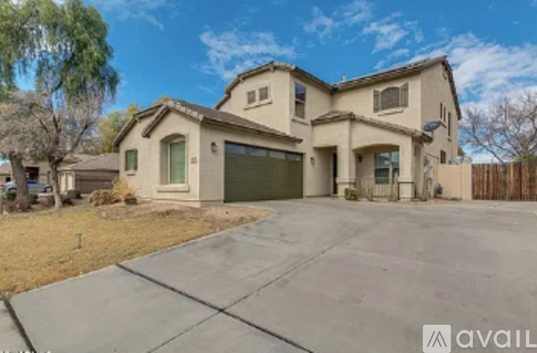 A house with a garage is available for sale.