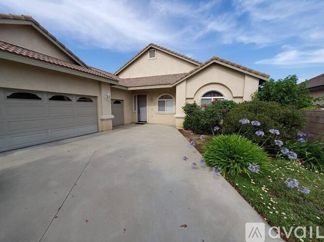 A house with a driveway and garage.