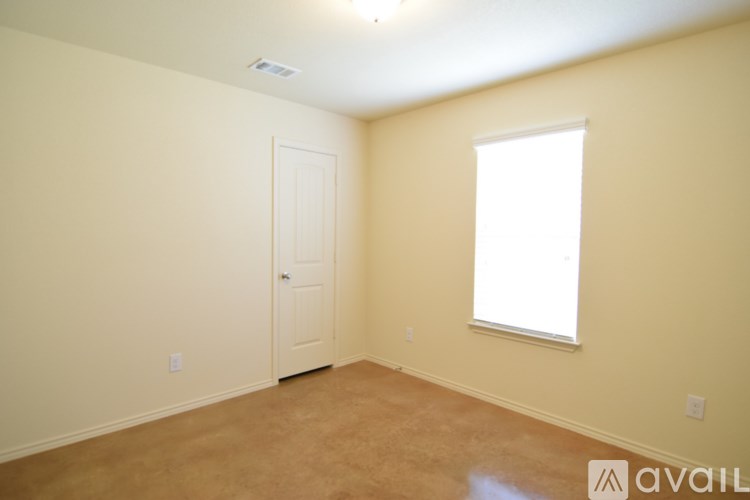 A room with a door and a window.