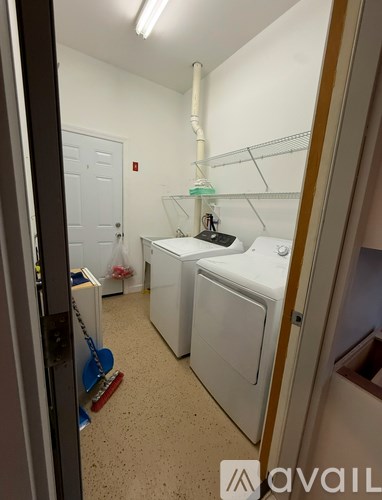 A laundry room with a washer and dryer.