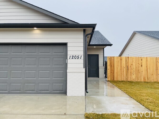 A house with the number 12051 on the front door.