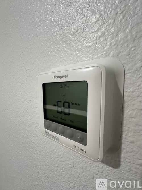 A Honeywell thermostat is set to 60 degrees.