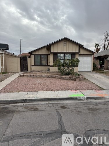 A house with a driveway in front of it.
