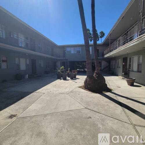 A sunny day at the courtyard of a residential building.