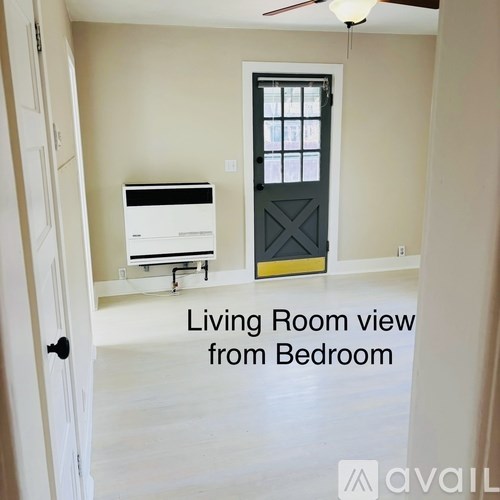 A living room viewed from the bedroom.