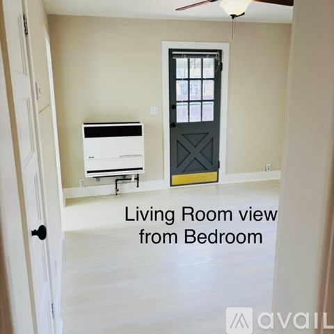 A living room viewed from the bedroom.