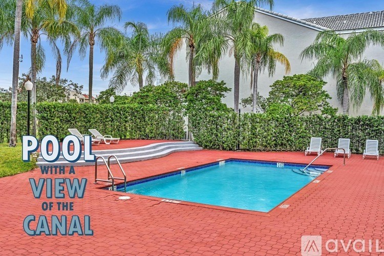 A pool with a view of the canal.