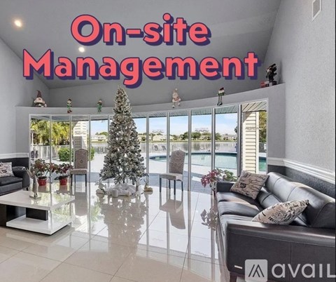 A modern living room with a Christmas tree and the words "On-site Management" displayed.
