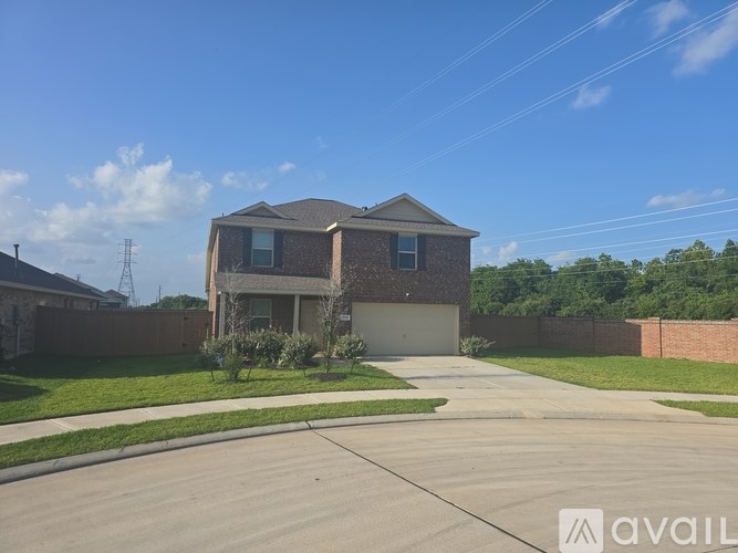 A house with a garage is available for sale.