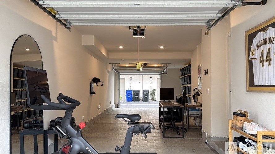 A room with a Husqvarna 44 poster on the wall.