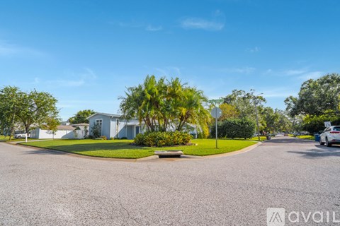 A residential area with houses and trees.