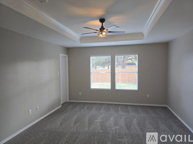 A white closet with shelves and a hanging rod.