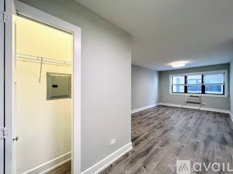 A room with a door and a window.