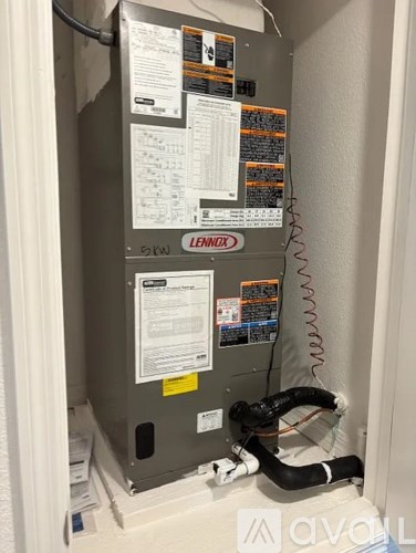 A LENIX branded appliance with many papers attached to it.