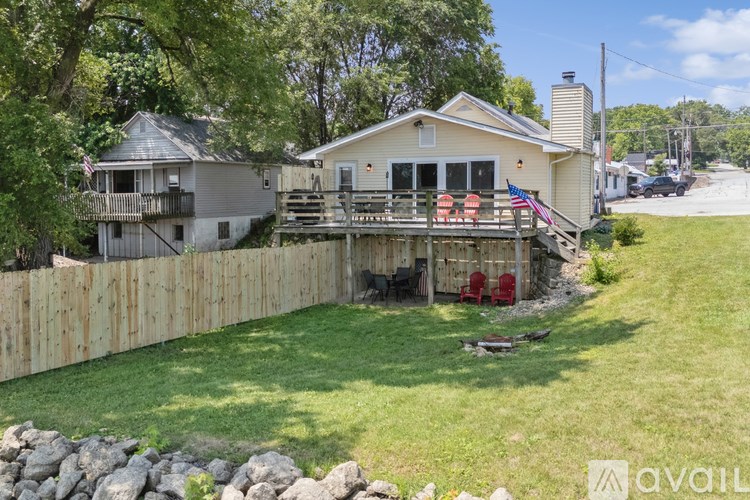 A house with a deck and a flag on it.