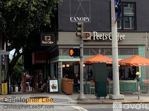 A Peets Coffee shop is located on the corner of a street.