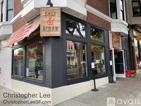 A storefront with a sign that says Salt & Straw.