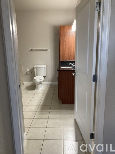 A bathroom with a toilet and sink.