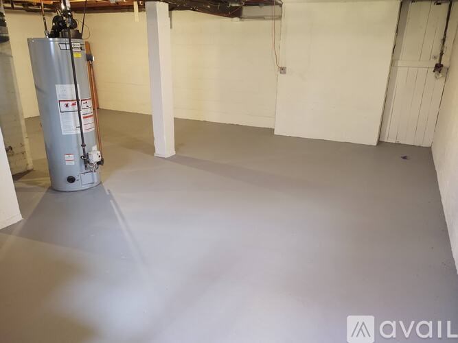 A room with a floor that is being heated by a radiator.