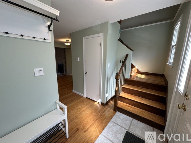 A room with a staircase leading to the second floor.