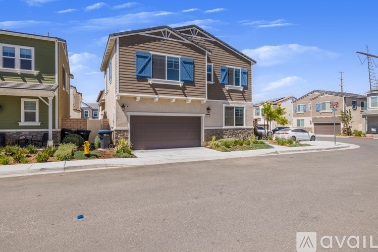 A house with a garage is available for sale.