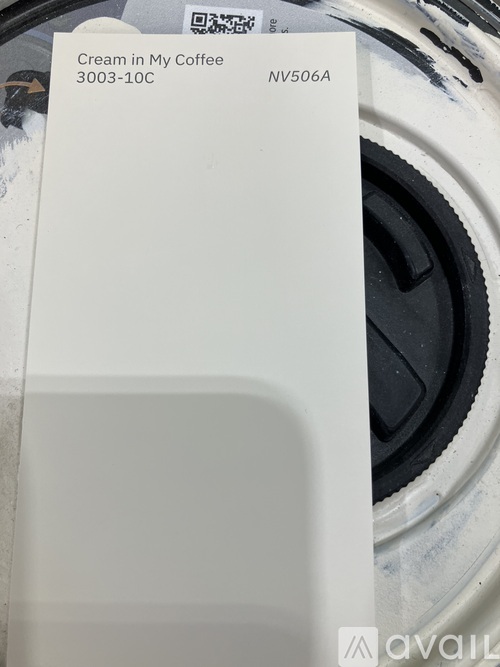 A white box with the text "Cream in My Coffee 3003-10C NV506A" on it.