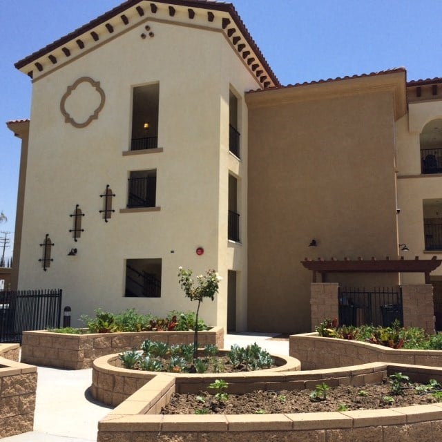 a large building with a courtyard in front of it