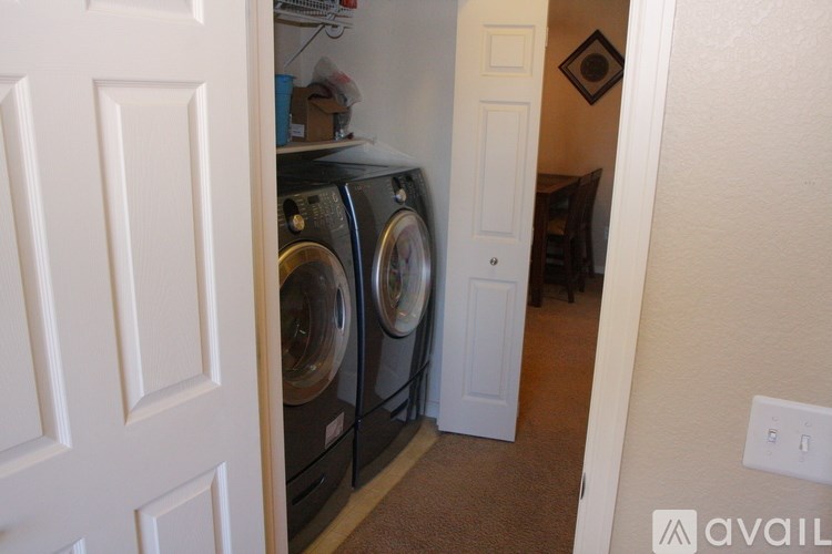 A laundry room with a washer and dryer.