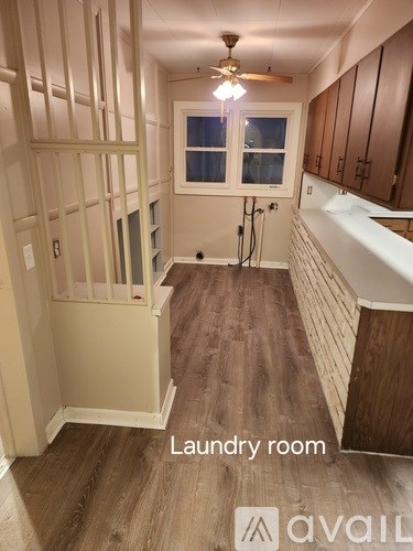A laundry room with a washer and dryer.