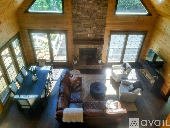 A living room with a fireplace and a couch.