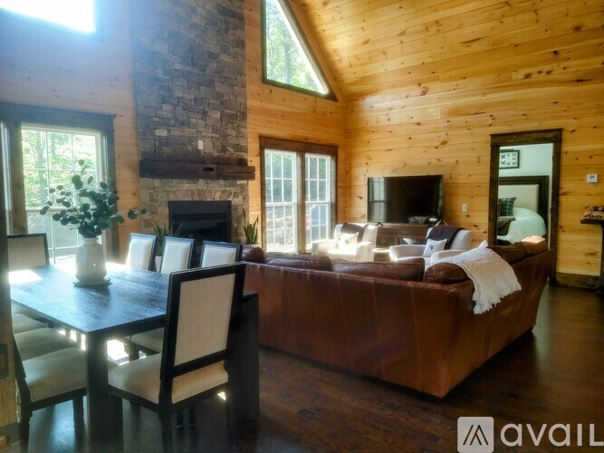 A living room with a fireplace and a couch.
