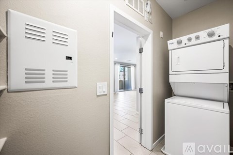 A white oven is installed in a kitchen.