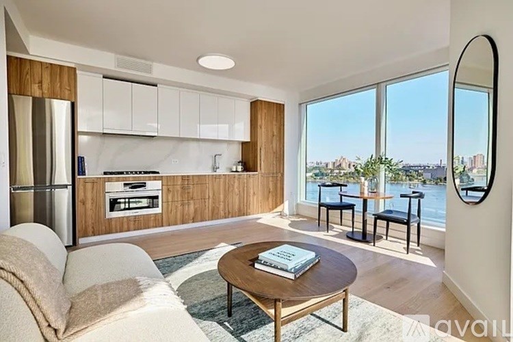 A modern living room with a view of the city.