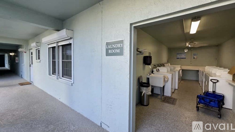 A room with a sign that says "AUDIO ROOM" on the wall.