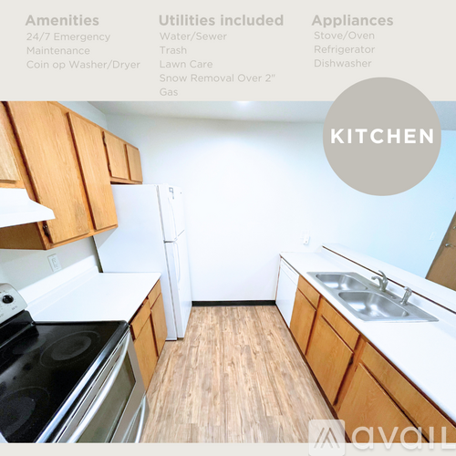 A kitchen with wooden cabinets and a stove top oven.