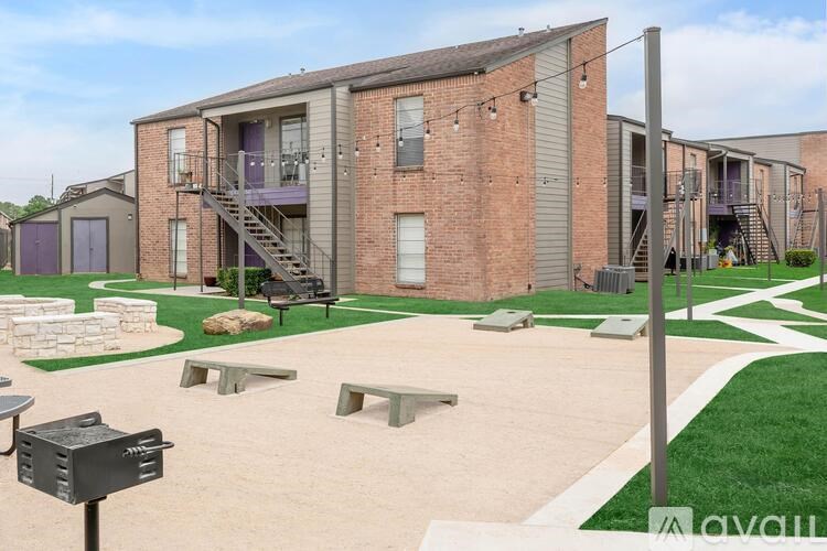 A residential area with apartment buildings and a mailbox.