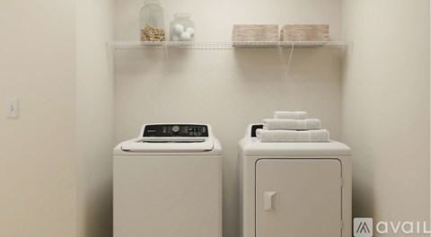 A laundry room with a washer and dryer.