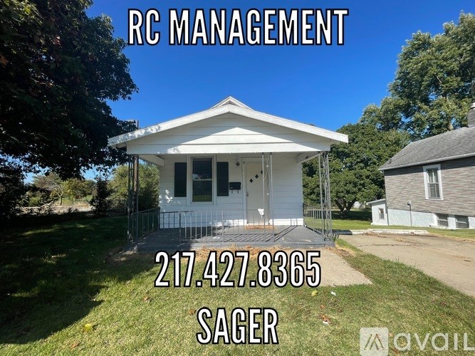 A house with the text RC MANAGEMENT and a phone number in front of it.