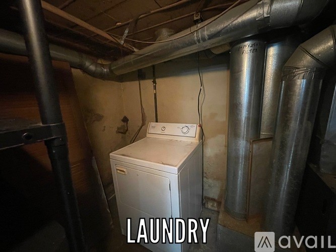 A laundry room with a washing machine and a dryer.