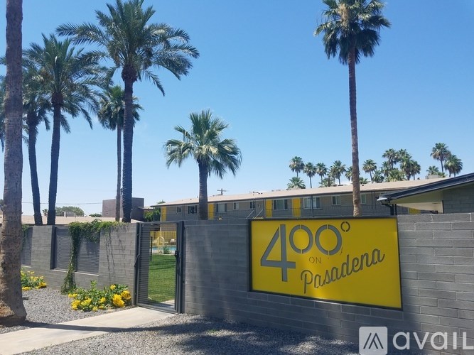 A sign that says 400 Pasadena is on a wall.